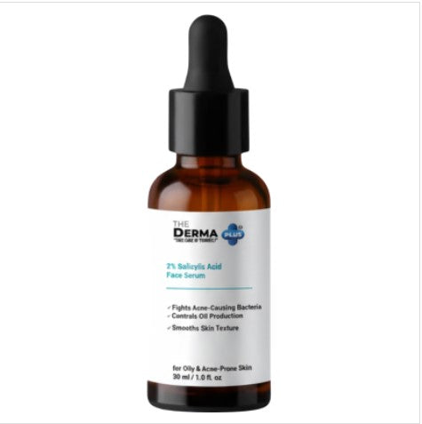 A 30ml glass dropper bottle of The Derma Plus 2% Salicylic Acid Face Serum for acne and oily skin, resting on a clean white background.