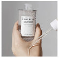A 30ml glass dropper bottle of SKIN1004 Madagascar Centella Tone Brightening Capsule Ampoule, designed to fade dark spots, hydrate, and calm sensitive skin.
