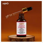 A 30ml glass dropper bottle of Skin'O Advanced Brightening Serum containing Niacinamide and Alpha Arbutin, resting on a clean white background, designed for fading dark spots and hydrating skin.